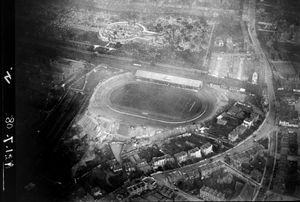 B&W photo of the stadium from the air