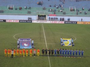 주황색 유니폼을 입은 부탄 축구 국가대표팀