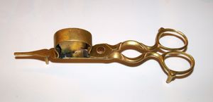 심지를 자르는 촛불 끄개