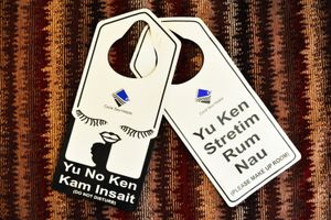 파푸아뉴기니 호텔 방문 표지판