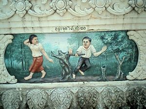 태국 도자기. "말벌집에 있는 나무등걸에 불을 지르지 마라"라는 속담을 보여준다.