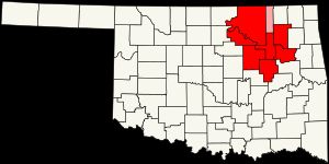 오클라호마 주 내 털사 대도시권(빨강)과 털사-버틀스빌 통합 통계 지역(분홍)