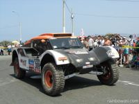 2013년 다카르 랠리(※2륜구동 SMG 버기로 이동 구간을 통과하는 겔랑 시셰리)