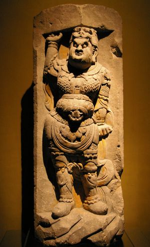 당나라 석조 부조, 산악 무늬 갑옷을 입은 무사