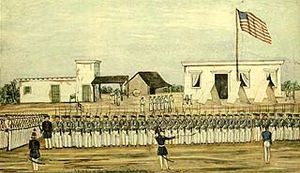 1847년 멕시코-미국 전쟁이 끝날 무렵, 기습적인 라파스 전투 이후 미 해병대가 라파스 상공에서 미국 국기를 게양하는 모습.