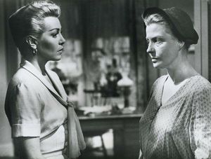 Two women facing one another