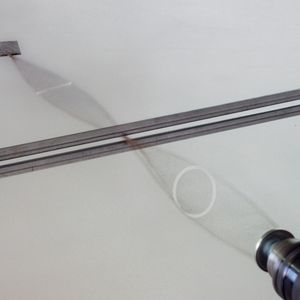 고무줄에 기계적으로 생성된 원편광, 기계적 편광 필터로 선형 편광으로 변환