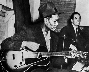 1940년 2월 7일, 메트로놈 올스타 세션 중 콜롬비아 스튜디오에서 진 크루파와 함께한 크리스천