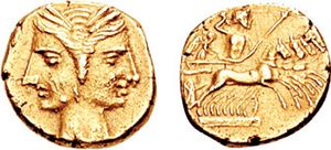 카르타고의 세켈. 카르타고 점령 기간(기원전 216-211년) 동안 브루티움의 주화 공장에서 주조되었을 가능성이 있다. 앞면에는 양면의 여성의 얼굴이, 뒷면에는 제우스가 번개와 홀을 들고 니케가 모는 사륜마차를 타고 있다.