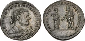 305~306년 아퀼레이아(Aquileia)에서 주조된 막시미아누스의 퇴위를 기념하는 은도금 폴리스(follis). 명문: DN MAXIMIANVS BAEATISSIMO SEN. AVG. / PROVIDENTIA DEORVM QVIES AVGG. S F.