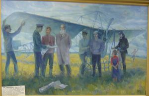 타티아나 이바노바가 그린 '시작'. 1911년 호딘카 비행장에서 안드레이 투폴레프(체리색 코소보로트카 셔츠를 입고 있음), 니콜라이 주코프스키 및 다른 러시아 항공 개척자들이 ITU 단엽기를 시험 비행 준비하는 모습을 묘사하고 있다.