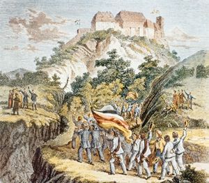 깃발을 들고 언덕 위를 향해 행진하는 학생들의 모습.