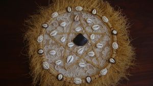 점복에 사용되는 딜로군(dilogun) 판