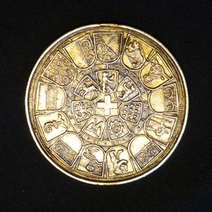 야코프 슈탐퍼(Jacob Stampfer)가 묘사한 스위스 십자가. 13개 주의 문장이 원형으로 배열된 중앙에 위치한다 (1546년 분데스탈러(Bundestaler); 그의 1547년 파텐프페니히(Patenpfennig)에는 두 천사가 받치고 있는 더 크고 길쭉한 십자가가 나타나 있다).