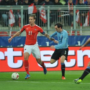 고딘(오른쪽)과 오스트리아의 마르크 얀코 (2014년 3월)