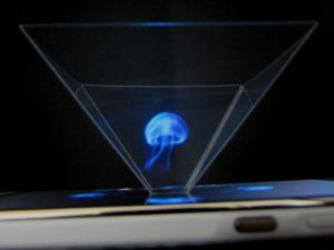 페퍼의 유령 원리를 이용한 투명 플라스틱 절두체로 만들어진 "홀로그램 프로젝터"