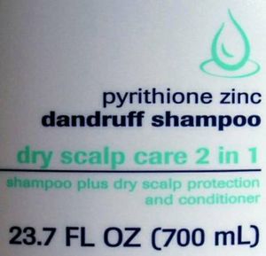 23.7 미국 액량 온스 (700 mL) 병의 부피가 미국 단위계와 SI 단위계 둘 다 적혀 있는 모습.