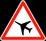 1977년 비엔나 협약 준수를 위해 변경된, 지상 또는 지상 근처 항공기 이동 경고 프랑스 표지판