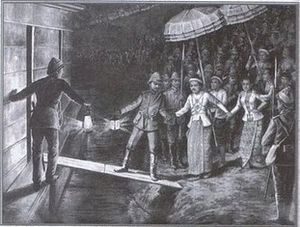 인도로 추방되는 티보(Thibaw) 왕을 기선에 태우려는 영국 관리. 왕은 다시는 버마로 돌아오지 못했다.