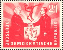 1951년 동독 우표. 조르젤레츠 조약(Zgorzelec)을 기념하며 오데르-나이세선을 "평화의 국경"으로 묘사하고, 동독의 빌헬름 피크(Wilhelm Pieck) 대통령과 폴란드의 볼레슬라프 비에루트(Bolesław Bierut) 대통령의 모습이 담겨 있다.