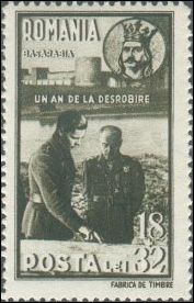 1942년 루마니아 우표. 소련 점령으로부터 베사라비아를 탈환한 1주년을 기념하며, 미하이 1세와 독재자 안토네스쿠의 모습이 "해방 1주년"이라는 문구 아래에, 배경에는 슈테판 대공의 초상화와 벤데르 요새가 등장한다.