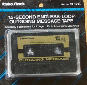 듀얼 카세트 기반 전화 응답기에 사용된 무한 루프 발신 메시지 테이프