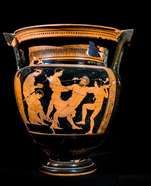 메데이아가 마법 상자를 들고 서 있는 가운데 탈로스의 플러그를 뽑는 모습(아테네 적색상 그림 원통형 크라테르, 기원전 450-400년)
