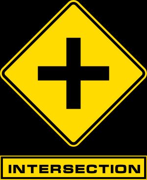 팀들이 합류해야 하는 단서 상자 위에 나타나는 인터섹션 표지판