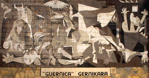 "Guernica" Gernikara}}, '게르니카(그림)를 게르니카로')라는 문구가 쓰여 있다.