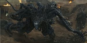 해변에 다양한 촉수 모양의 사지를 가진 괴물.