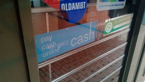 올드암트, 윈쇼텐의 그로닝거 시에 있는 온라인 결제 서비스 표지판