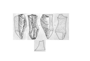 양극 타격을 사용하여 박편이 제거된 흑요석 코어의 예시