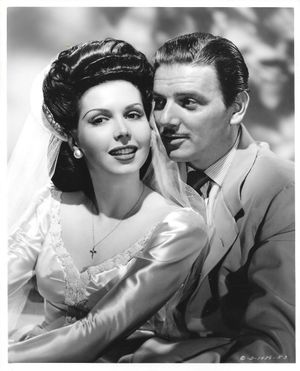 밀러가 이브는 사과를 알고 있었다(1945)에서 윌리엄 라이트와 함께 있는 모습