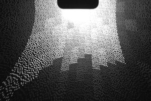 Face ID를 탑재한 아이폰이 투사하는 적외선 점