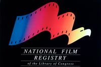 The image includes a logo on a black background. The logo looks like a film reel and changes from left-to-right to an eagle. The logo is multi-colored and below it is the phrase "National Film Registry of the Library of Congress".