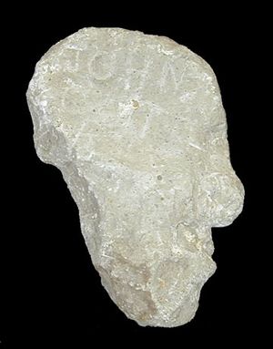 1931년 아이다호주 동부 들판에서 발견된 콜터 스톤. "존 콜터"라는 글자가 새겨져 있다.