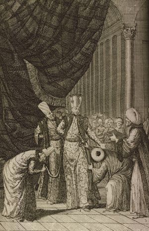 아흐메트 3세가 술탄으로 선포되고 오스만의 검을 차고 있다.