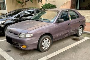 현대 뉴 엑센트 (4도어) 정측면