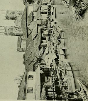 1907년 믈라카 강, 배경의 믈라카 시의 성 프란시스 자비에르 교회