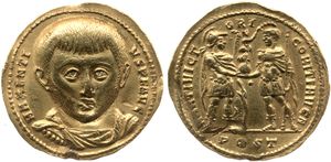 아우레우스 막센티우스. 전설: MAXENTIVS P F AVG / MARTI VICTORI COMITI AVG N