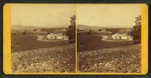 Two nearly identical images side by side in [[stereograph]] format of a small 19th century college campus.  In the foreground are neatly planted rows of crops.  The nearest building is an ornate 19th century conservatory or greenhouse.  In the distance, on a ridge, are three brick academic buildings.