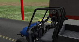 Atlas 로봇이 차량에 올라가는 모습. 이미지는 Gazebo 컴퓨터 시뮬레이션에서 재현되었다.