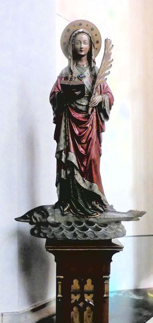 성 아말베르가가 철갑상어를 타고 있는 모습