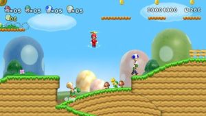 New Super Mario Bros. Wii는 동시 4인 플레이 플랫폼 게임 플레이를 특징으로 하는 최초의 Super Mario 시리즈 작품이다. E3 2009에서 공개된 이 게임의 초기 스크린샷에서 플레이어는 서로를 잡고 옮길 수 있으며, 루이지가 파란 토드를 그렇게 하고 있다.
