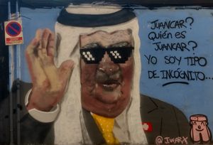 후안 카를로스 1세가 아부다비로 이주한 것에 대한 발렌시아 베니마클렛의 풍자 벽화.('후안카르? 후안카르가 누구야? 내 이름은 정체 불명이야'라는 문구는 심슨 가족 에피소드를 인용한 것이다.)