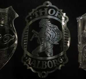 20세기 초 덴마크 자전거 헤드 배지에 묘사된 토르