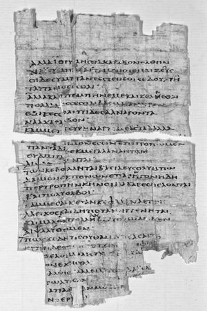 Black and white photograph of a fragment of papyrus with Greek text