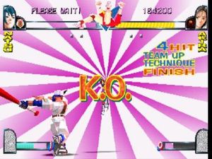 아키라가 팀 업 공격으로 나츠를 쓰러뜨리는 모습