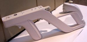 Wii 리모컨과 눈차크가 삽입된 Wii 자퍼