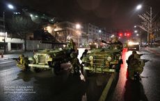 군사 훈련에서 새벽의 서울 시가지에 전개한, 대한민국 육군수도방위사령부 소속 K-116 (2013년1월 13일 촬영)